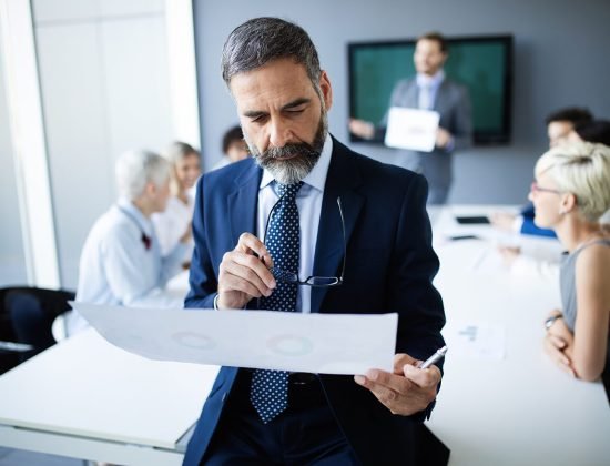 shot-of-thinking-financial-advisor-businessman-wor-WBVSK8G.jpg